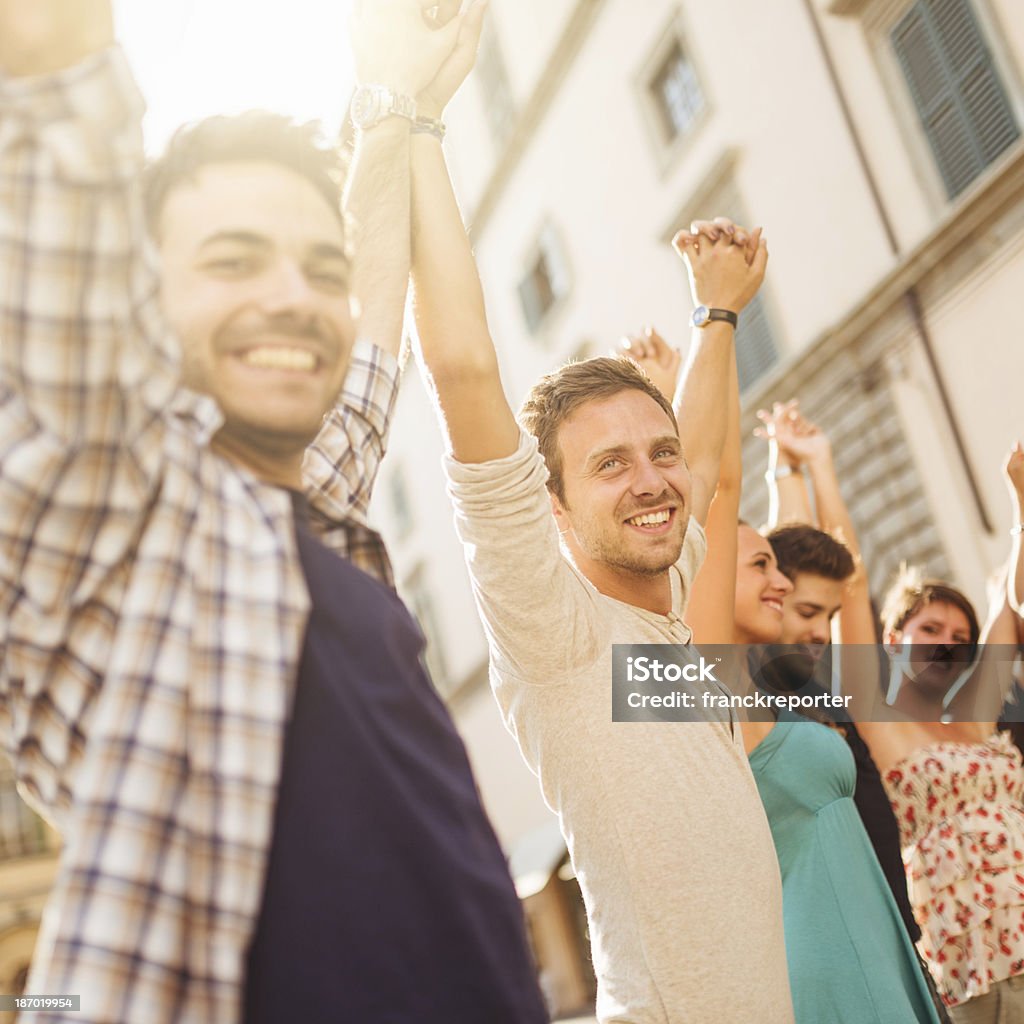 Happiness friends volunteer on the city http://blogtoscano.altervista.org/tee.jpg  20-29 Years Stock Photo