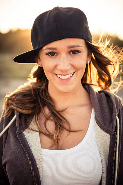 istock Young happy woman with hip hop hat 187020537