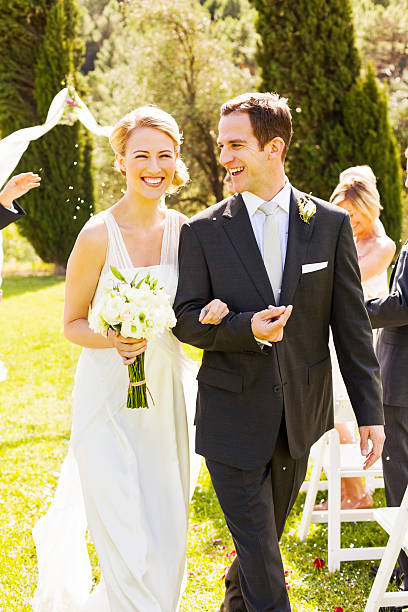istock Bride And Groom Walking Together During Wedding Ceremony 187021055