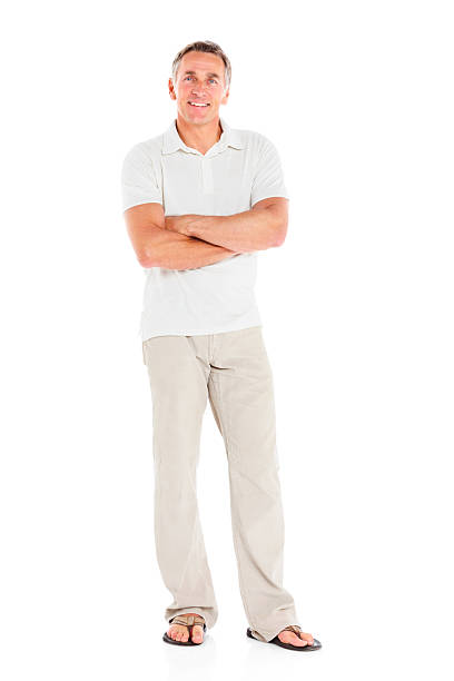 istock Mature man standing with arms crossed on white 187021289