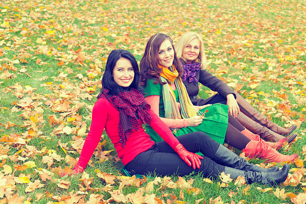 istock young women in the autumn park 187021300