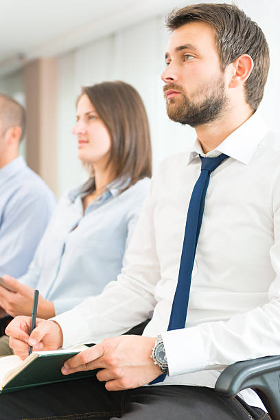 istock Young Businessman at business conference 187021627