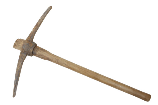 large old rusty pick axe isolated with clipping path