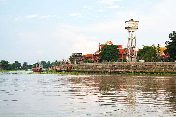 Chao Praya and Wat Phanan Choeng Chao Prayeand Wat Phanan Choeng in Ayutthaya. Shot while crossing river. wat phananchoeng stock pictures, royalty-free photos & images