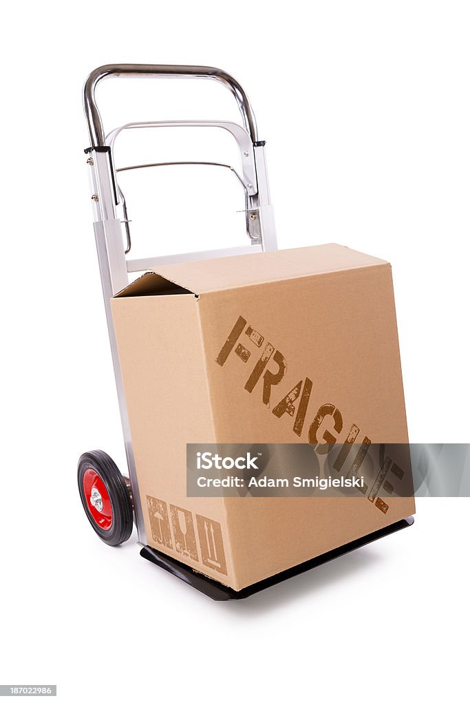 hand truck and carton box (clipping path) hand truck and carton box isolated on white background; with clipping path Abstract Stock Photo