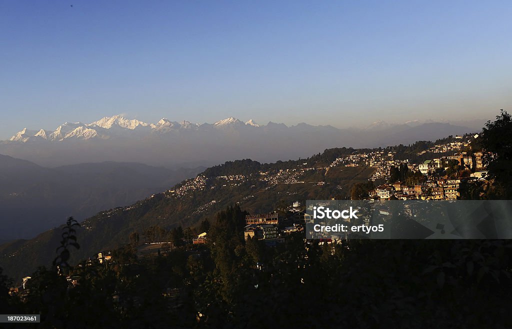 Himalayan mountains are seen near Darjeeling, India Himalayan mountains are seen near  Darjeeling, India. Darjeeling lies at the base of the Himalayan mountinas in Northeastern India. Darjeeling - India Stock Photo