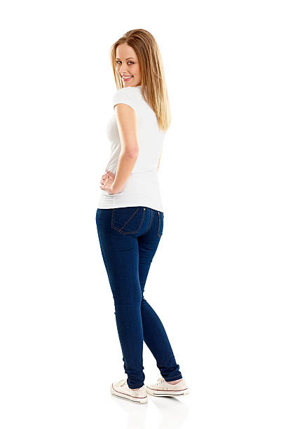 istock Happy young girl looking back at you 187023818