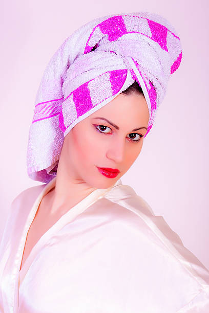 istock girl wearing towel on her head 187023933