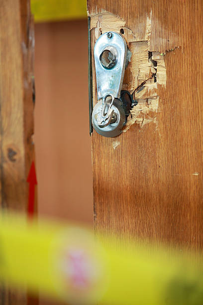 istock Break-in damage on doors with police band 187025373