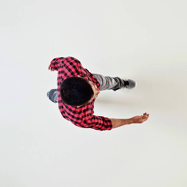 Over head view of young man walking