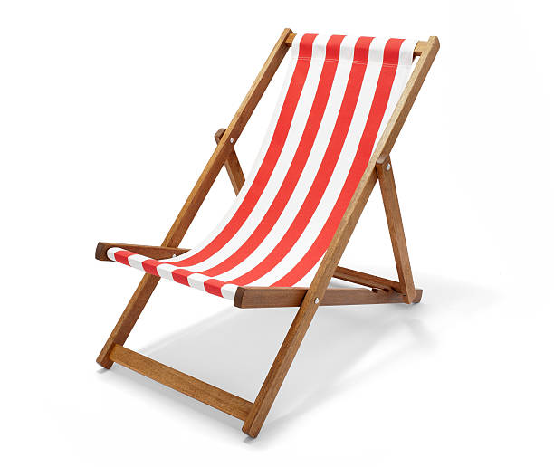 Deck Chair Studio photo of a red striped deck chair isolated on white with clipping path. deck chair stock pictures, royalty-free photos & images