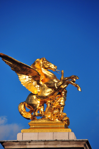 Paris, France: Alexandre III bridge - Pegasus held by the Fame of Combat - 1897 sculpture by Pierre Granet - photo by M.Torres