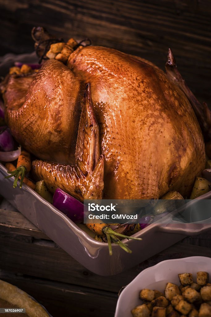 Roasted Thanksgiving Turkey with Side Dishes Roasted Thanksgiving Turkey with side dishes and autumn decoration American Culture Stock Photo