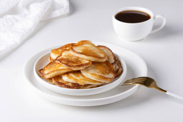 istock Pancakes for Breakfast. Delicious Breakfast pancakes and coffee 1870272007