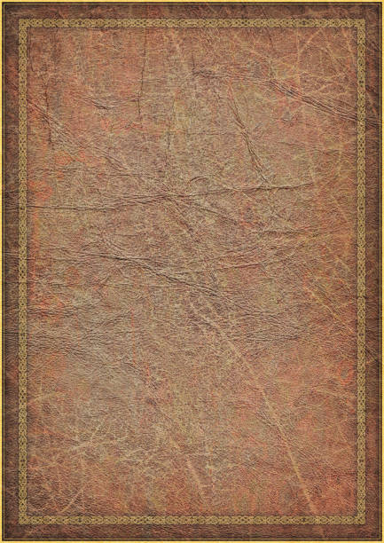 istock High Resolution Animal-skin Parchment with Medieval Arabesque Gilded Decorative Border 187028670