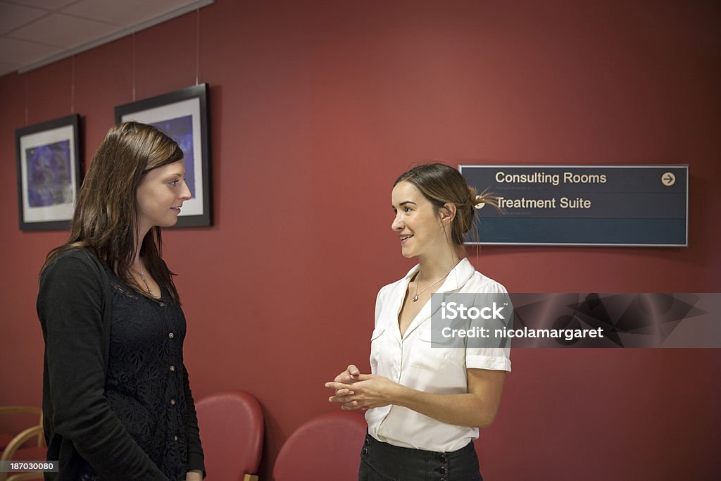 Physical Therapist Series: meeting the patient Health professional meeting with female patient or colleague. 25-29 Years Stock Photo