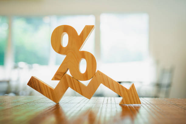 istock Percentage model and down arrow, concepts for success, methods, systems of raising or lowering Fed interest rates to correct inflation concepts. 1870301004