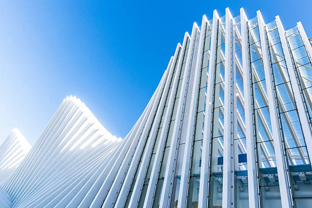 Abstract White Architecture Building on Clear Blue Sky stock photo