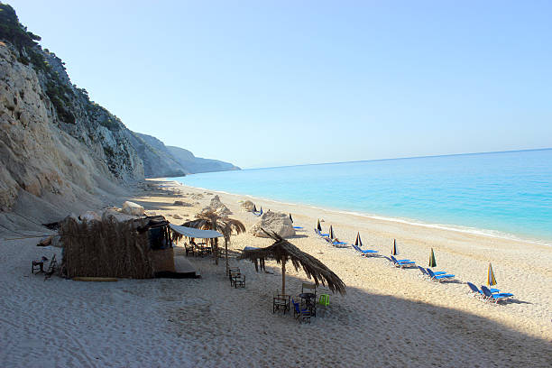 Little bar at Egremni Beach - Lefkada Island (Greece) This is one of the most beautiful beaches in the whole world. It is located at the Lefkada Island (Levkas). egremni beach lefkada island greece stock pictures, royalty-free photos & images