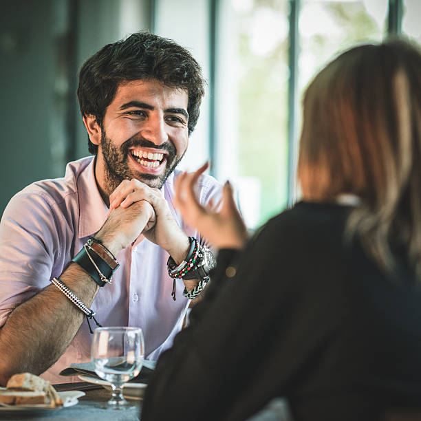 istock happiness couple laughing at the restaurant 187030675