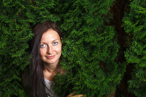 istock Young woman in the garden 187030754