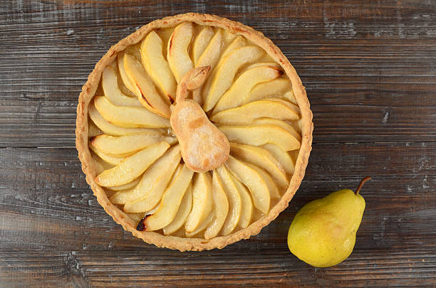 Pear Tart An elegant tart made with fresh sliced bartlett pears. bartlett pear stock pictures, royalty-free photos & images