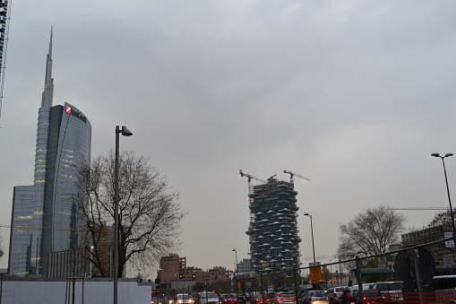 Milan,Italy - April 11, 2013: Panoramic view of the financial, commercial and residential urban Porta Nuova district of the Milan City in  a cloudy spring day at sunset.