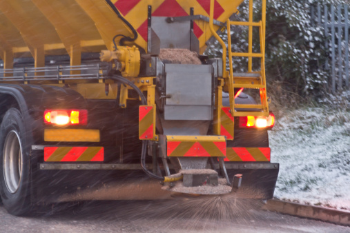 Gritting vehicle salts the road to help keep traffic safe and moving