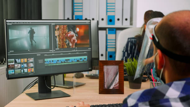 istock Paralysed man videographer with face mask arguing with colleague 1870317717