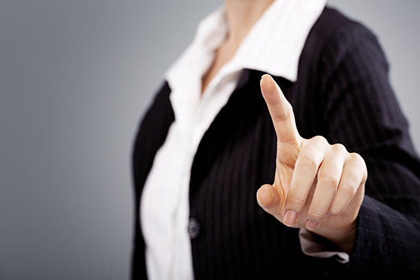 istock Businesswoman pressing button on touch screen 187032517