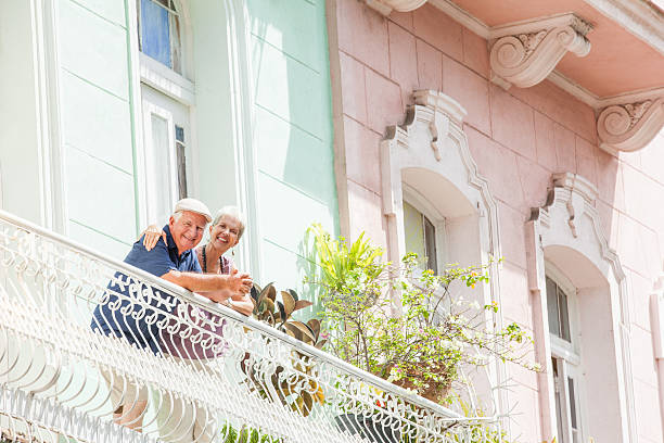 istock Happy senior couple on a balcony 187033298
