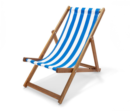 Studio photo of a blue striped deck chair isolated on white with a clipping path.