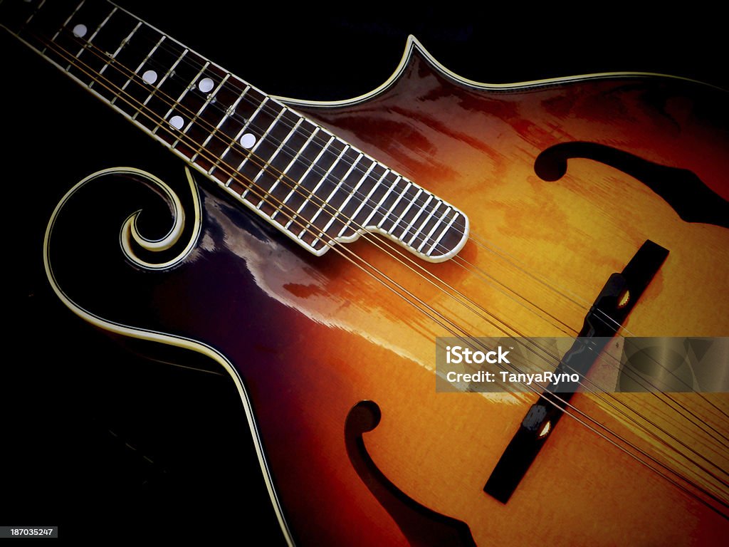 Close-up of a Mandolin Close-up of a beautiful wooden musical instrument, the Mandolin. Equipment Stock Photo