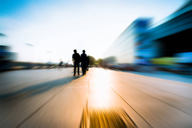 istock silhouettes and shadows of  people walking 187037115