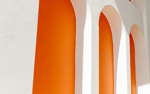 White and orange arches. Architectural design, Spainish construction style.