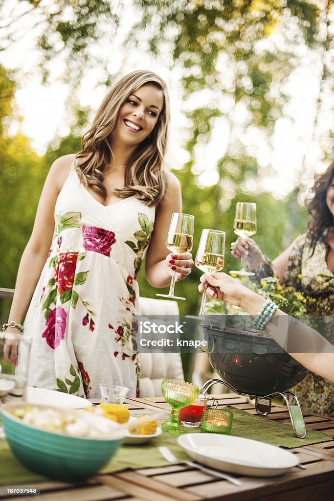 Beautiful women outdoors on patio Beautiful women outdoors on patio  Patio Stock Photo