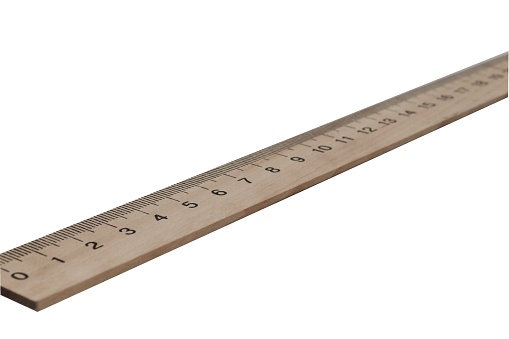 Wooden student ruler on a white background.