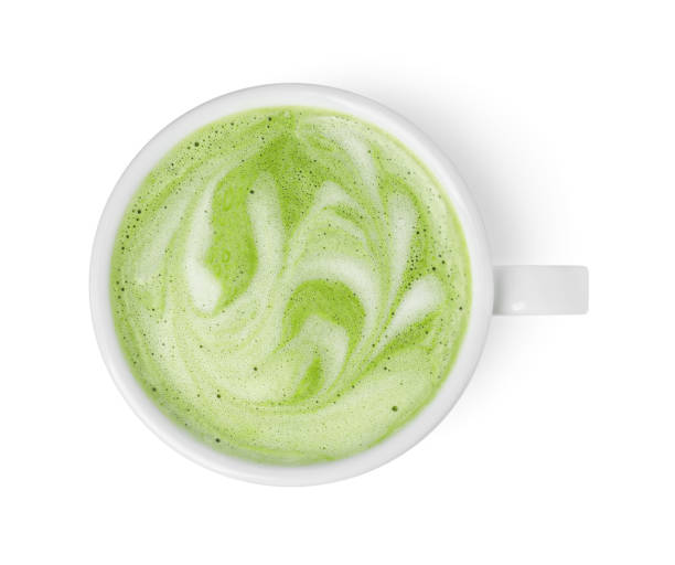 istock Cup of fresh matcha latte isolated on white, top view 1870376325