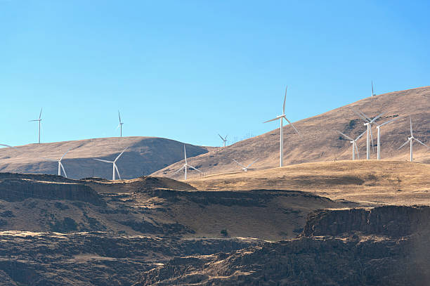 istock Power Generating Windmills on top of cliffs 187037923