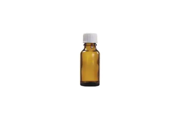 Photo of Glass translucent brown medicine bottle with a white cap on a white background.