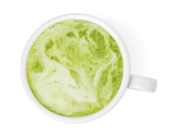 istock Cup of fresh matcha latte isolated on white, top view 1870381600