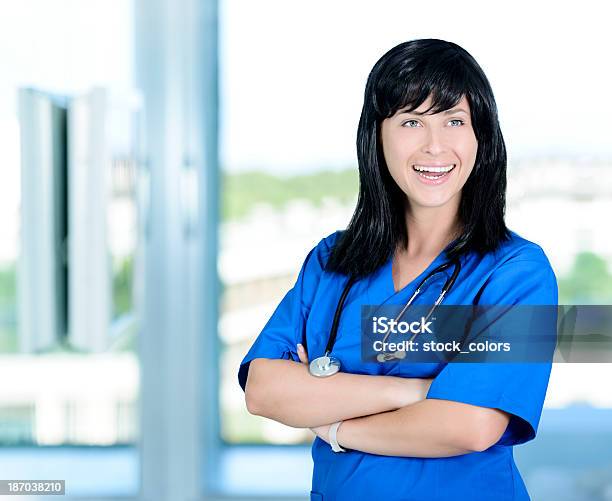 Cheerful Doctor Stock Photo - Download Image Now - 25-29 Years, Adults Only, Arms Crossed