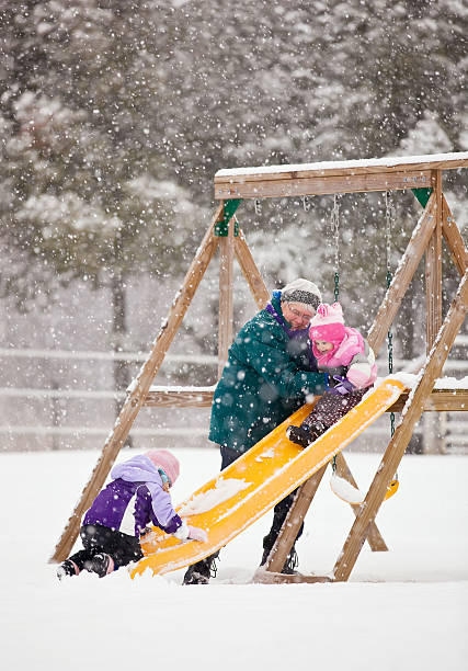 Girls & Grandma Playing During Snow Storm
