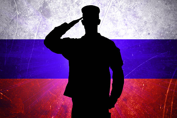 istock Proud male soldier on russian flag background 187038704