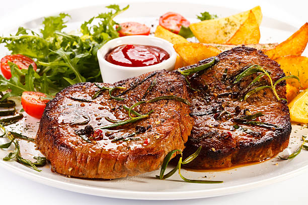 istock Grilled meat, potatoes and vegetables 187039033