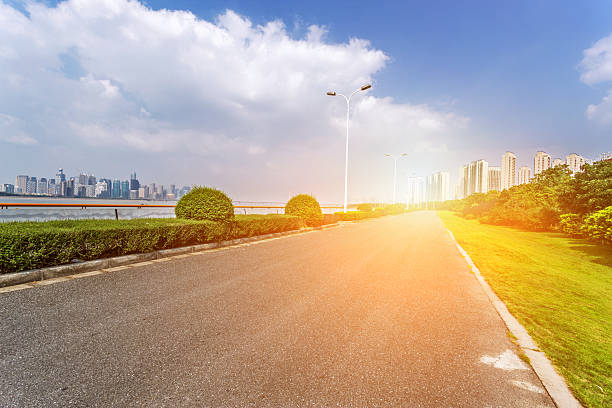 istock road through the garden 187039150