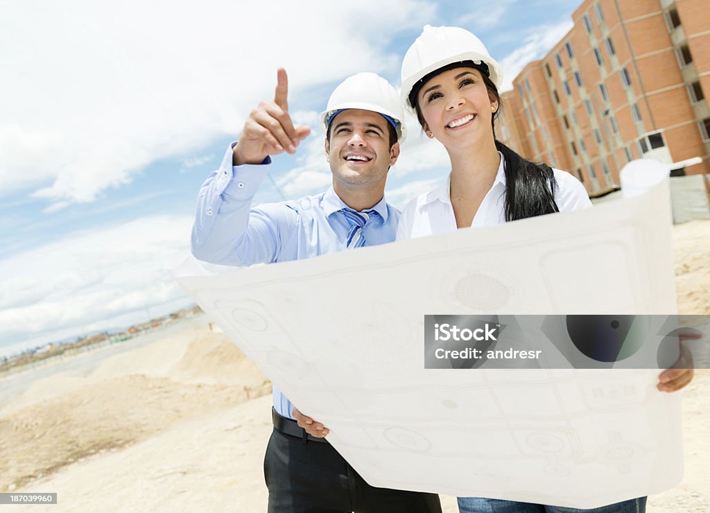 Couple of architects smiling - 로열티 프리 건설 산업 스톡 사진