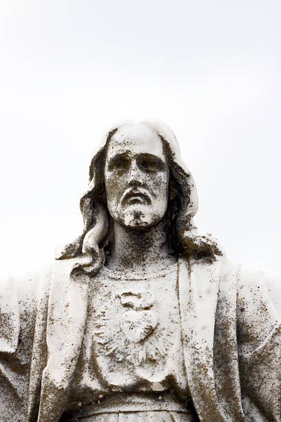 istock Jesus Christ, old weathered statue against white background, copy space 187040126