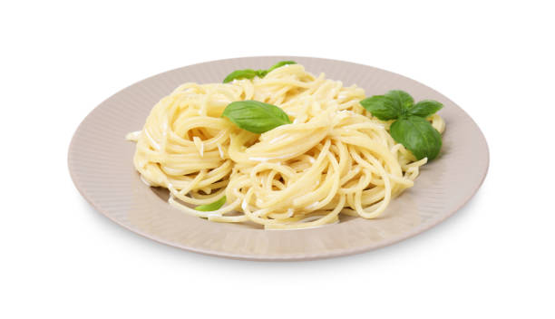 istock Delicious pasta with brie cheese and basil leaves on white background 1870401464
