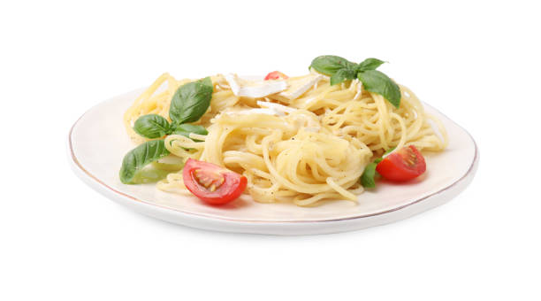 istock Delicious pasta with brie cheese, tomatoes and basil leaves on white background 1870401843